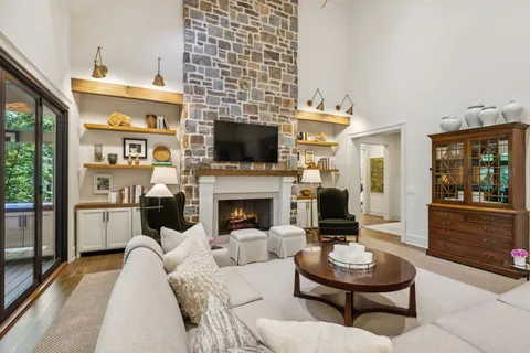 a kitchen with stainless steel appliances granite countertop a stove and a sink
