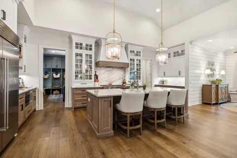 a dining room with furniture window wooden floor