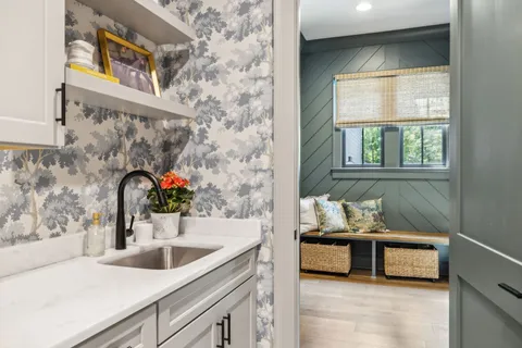 a living room with furniture and a table