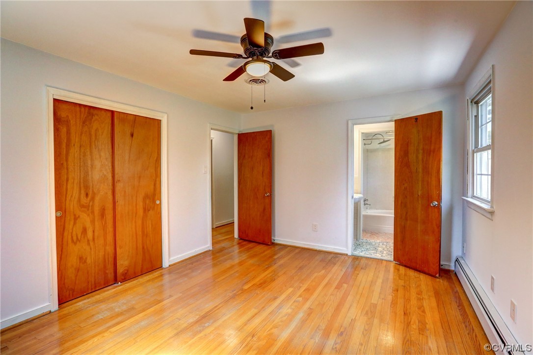 8207 Colebrook Road Richmond, VA 23227 - Photo 18 of 35 wooden floor in an empty room with a window