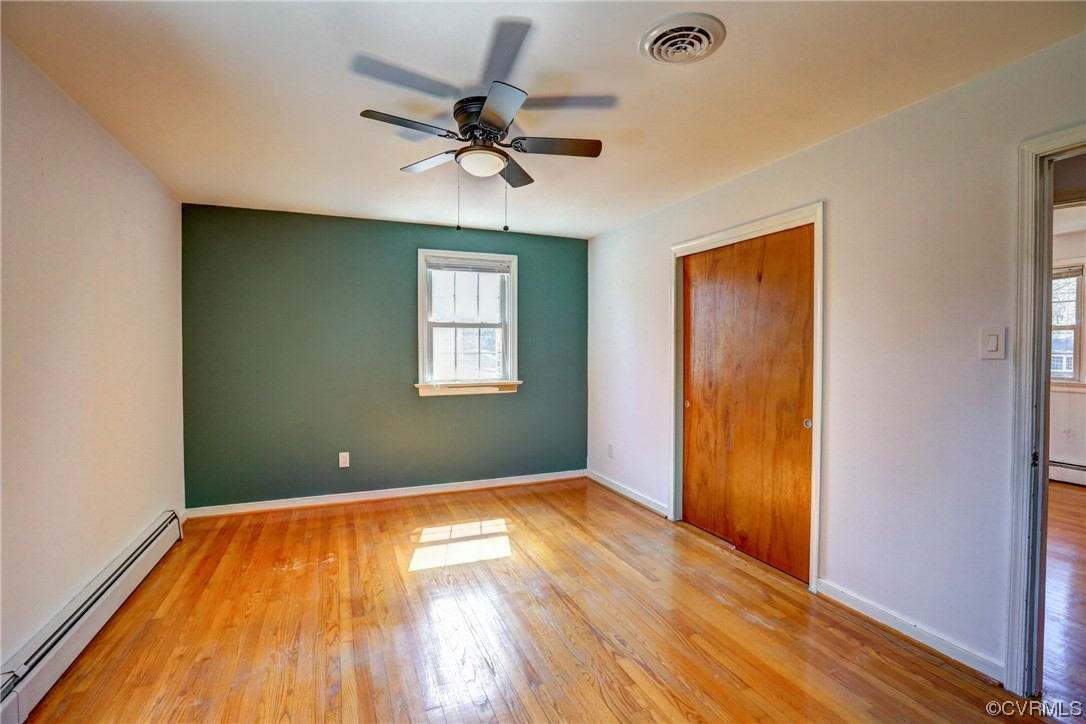 8207 Colebrook Road Richmond, VA 23227 - Photo 19 of 35 a view of room with window and wooden floor