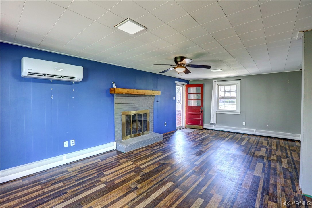 8207 Colebrook Road Richmond, VA 23227 - Photo 25 of 35 a view of an empty room with wooden floor fireplace and a window