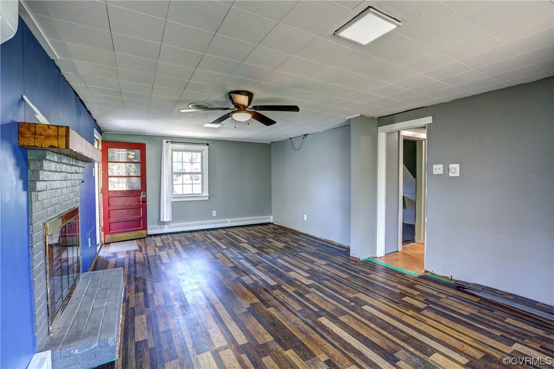 8207 Colebrook Road Richmond, VA 23227 - Photo 26 of 35 a view of an empty room with window and wooden floor