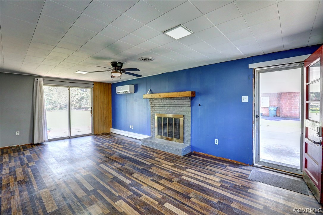 8207 Colebrook Road Richmond, VA 23227 - Photo 27 of 35 a view of an empty room with window and wooden floor
