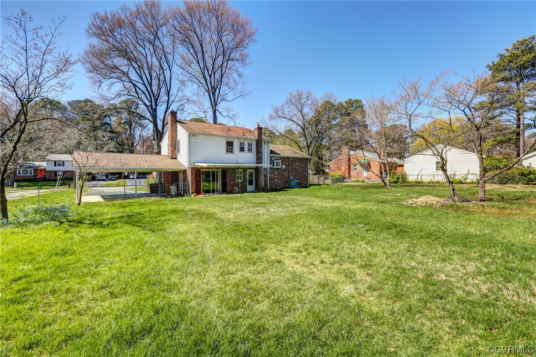 8207 Colebrook Road Richmond, VA 23227 - Photo 29 of 35 a view of a house with a big yard with large trees