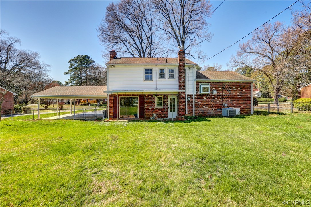 8207 Colebrook Road Richmond, VA 23227 - Photo 32 of 35 a front view of a building with a garden