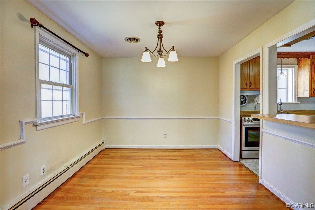 8207 Colebrook Road Richmond, VA 23227 - Photo 6 of 35 wooden floor in an empty room with a window