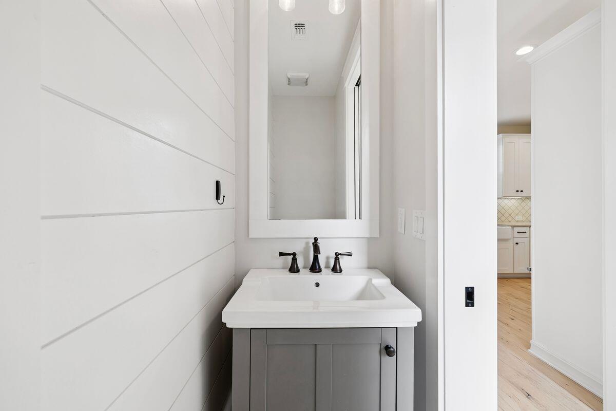 414 Ridgewalk Circle Santa Rosa Beach, FL 32459 - Photo 15 of 47 a bathroom with a sink and a mirror