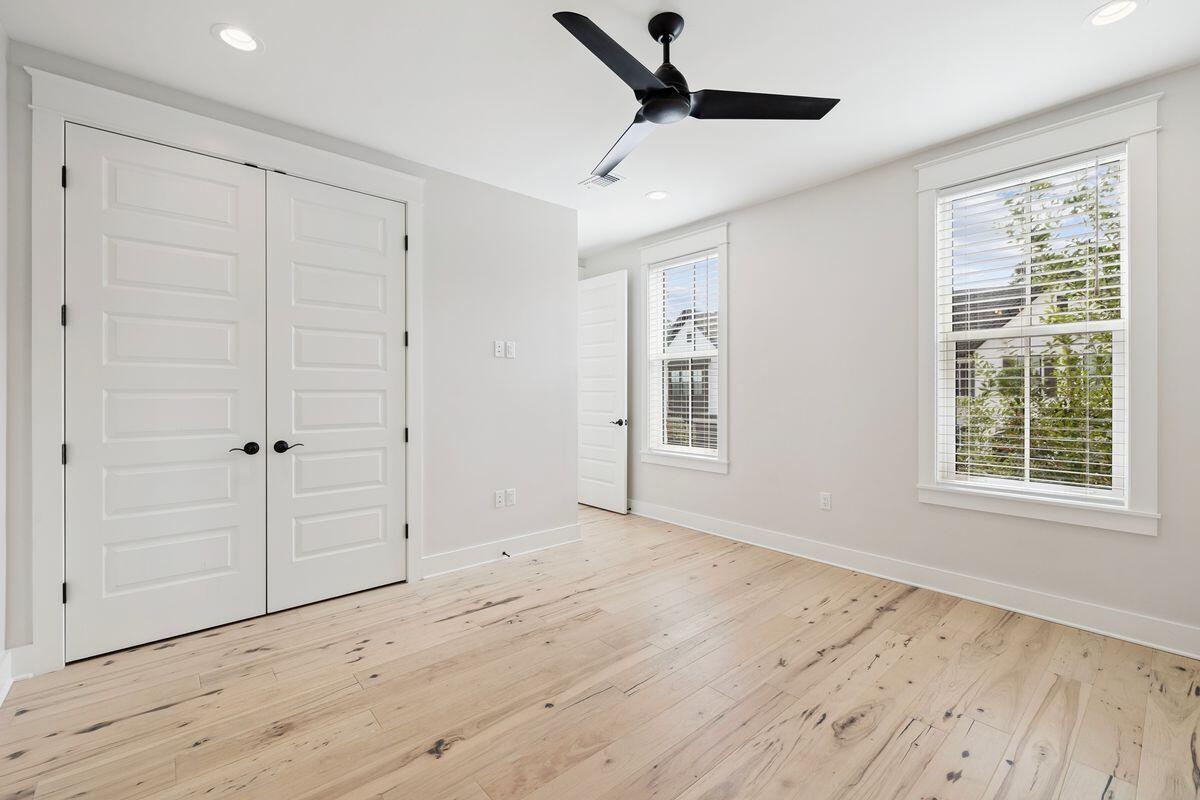 414 Ridgewalk Circle Santa Rosa Beach, FL 32459 - Photo 19 of 47 a view of empty room with wooden floor and window
