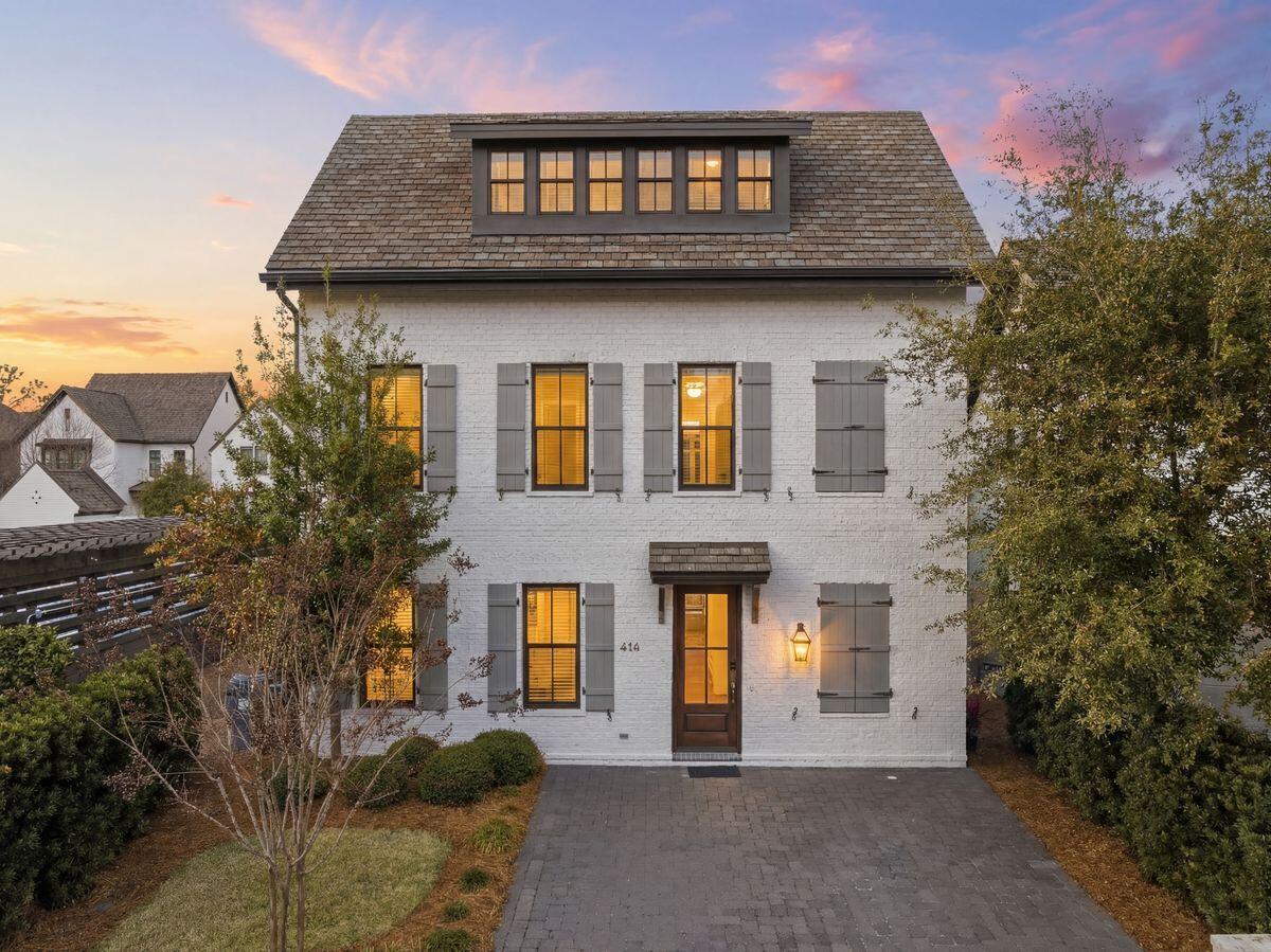 414 Ridgewalk Circle Santa Rosa Beach, FL 32459 - Photo 2 of 47 a front view of a house with plants