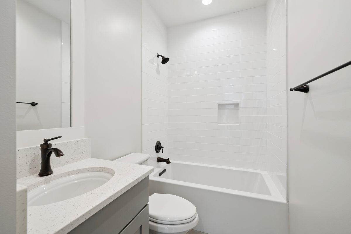 414 Ridgewalk Circle Santa Rosa Beach, FL 32459 - Photo 22 of 47 a bathroom with a sink toilet and a bathtub