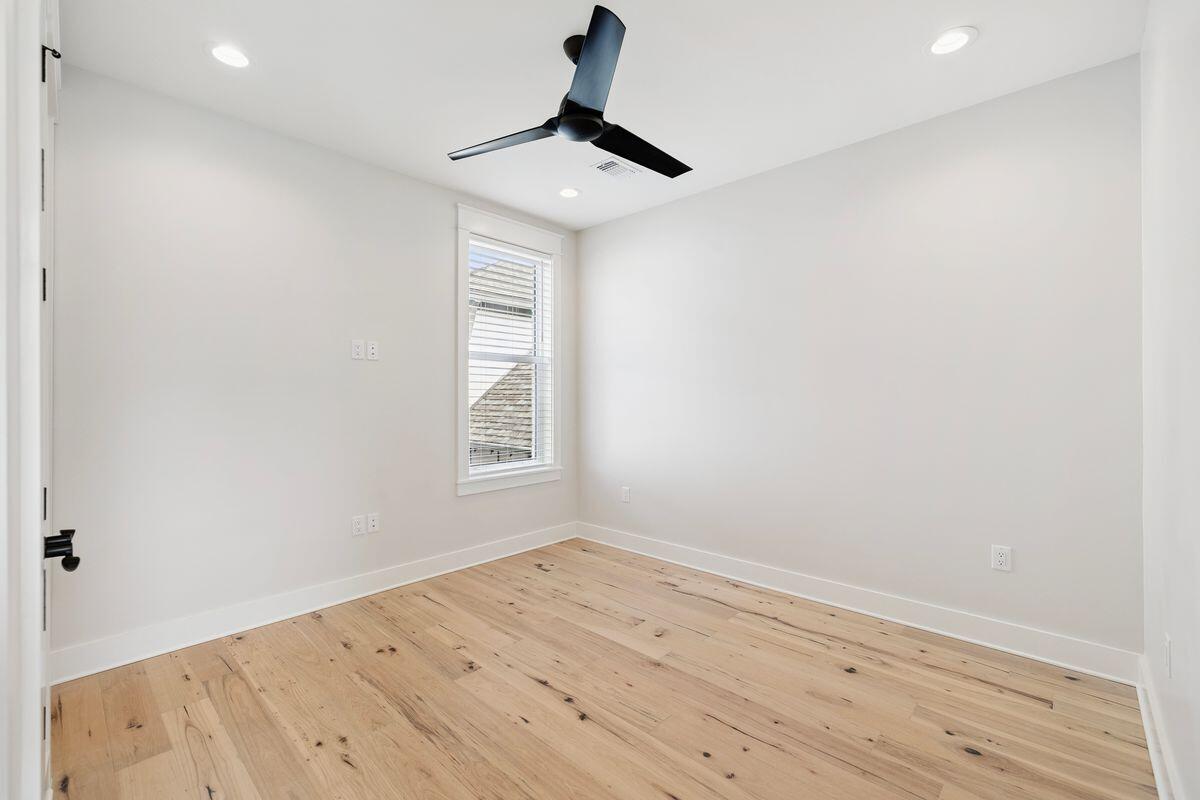 414 Ridgewalk Circle Santa Rosa Beach, FL 32459 - Photo 26 of 47 a view of empty room with wooden floor