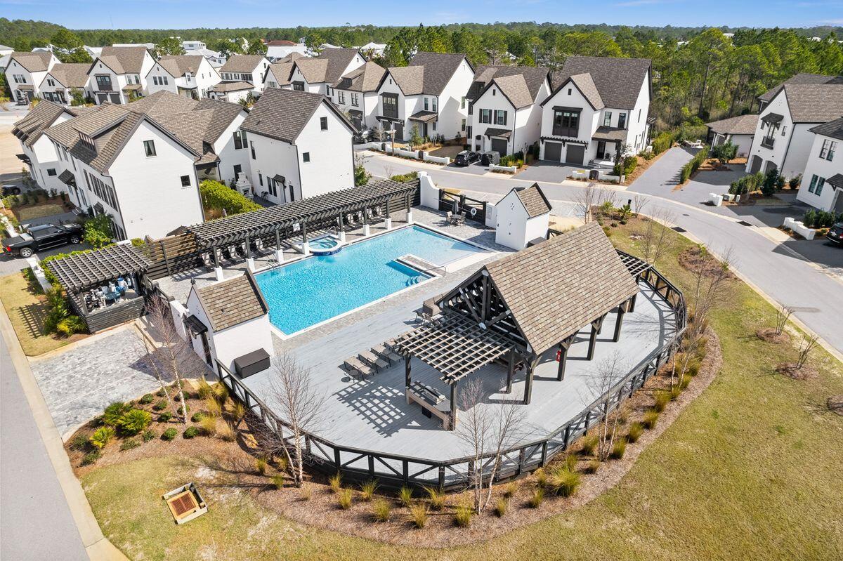 414 Ridgewalk Circle Santa Rosa Beach, FL 32459 - Photo 42 of 47 an aerial view of a house with swimming pool and patio