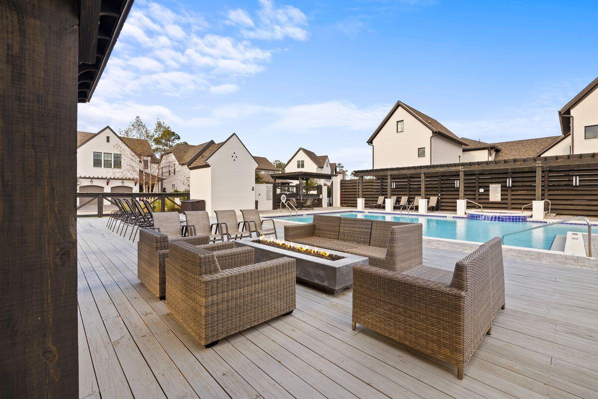 414 Ridgewalk Circle Santa Rosa Beach, FL 32459 - Photo 43 of 47 a view of house with patio outdoor seating and wooden floor