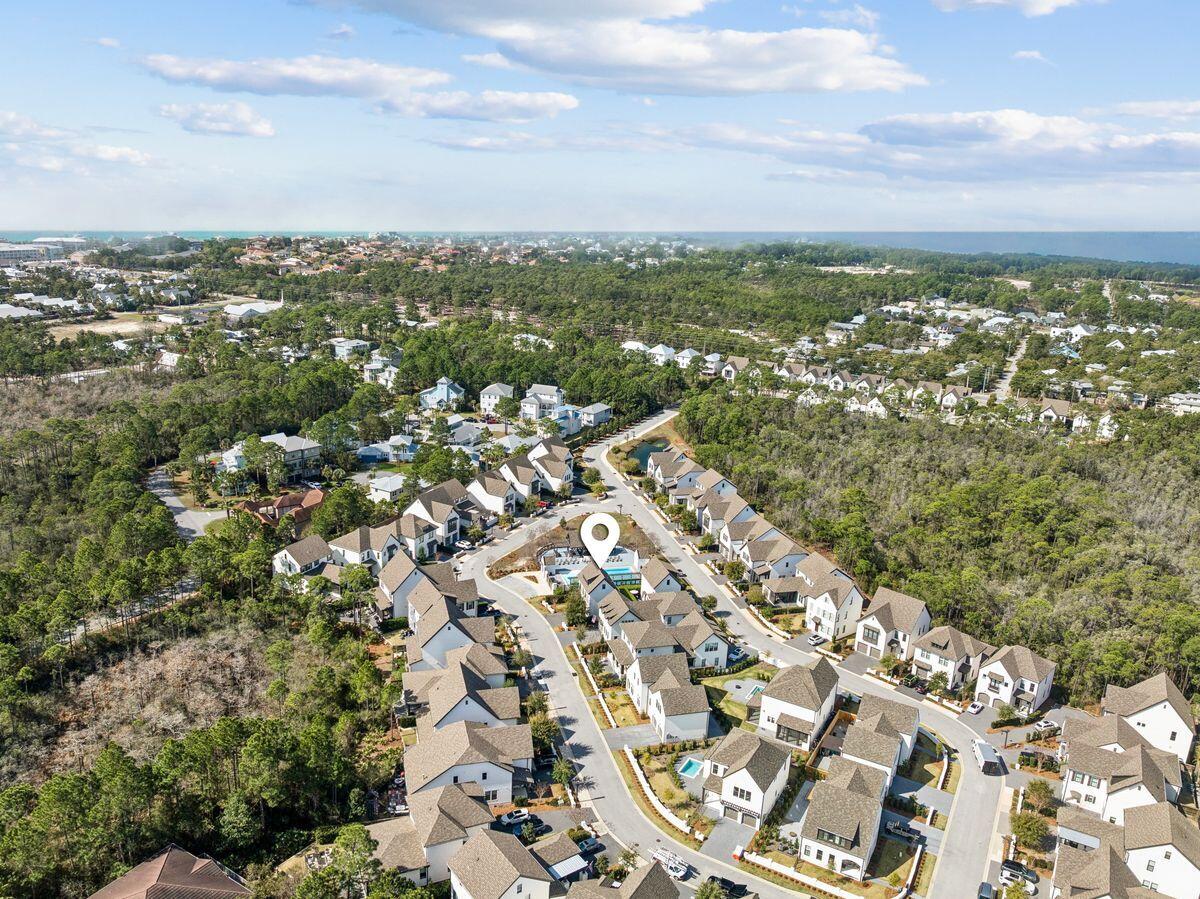 414 Ridgewalk Circle Santa Rosa Beach, FL 32459 - Photo 46 of 47 an aerial view of residential building with parking space