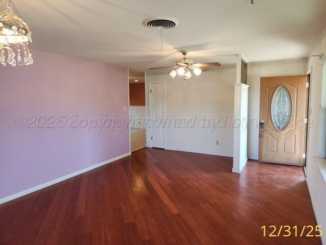 3401 Sunlite Street Amarillo, TX 79109 - Photo 2 of 26 wooden floor in a hall with an entryway