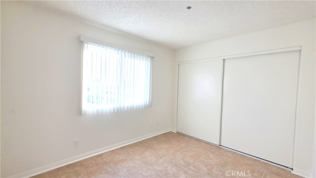 7331 9th Street, Unit 2 Buena Park, CA 90621 - Photo 12 of 19 an empty room with windows