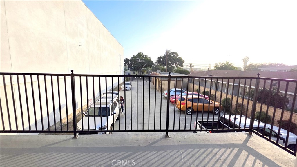 7331 9th Street, Unit 2 Buena Park, CA 90621 - Photo 16 of 19 a view of balcony with wooden floor