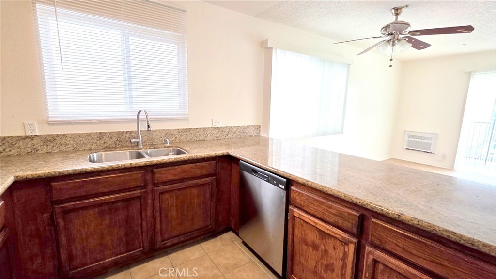 7331 9th Street, Unit 2 Buena Park, CA 90621 - Photo 6 of 19 a kitchen with a sink and a window