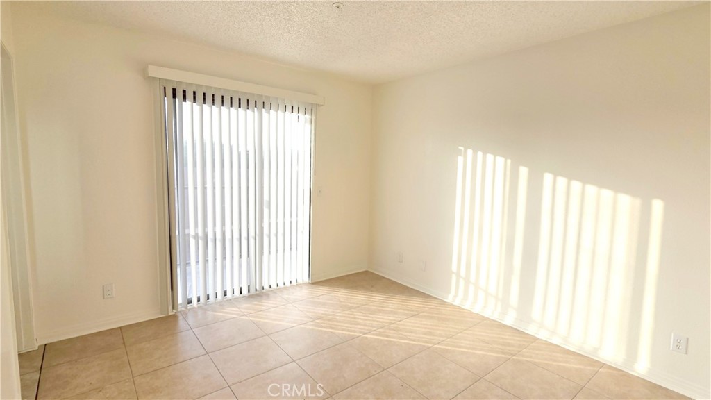 7331 9th Street, Unit 2 Buena Park, CA 90621 - Photo 9 of 19 a view of an empty room and window