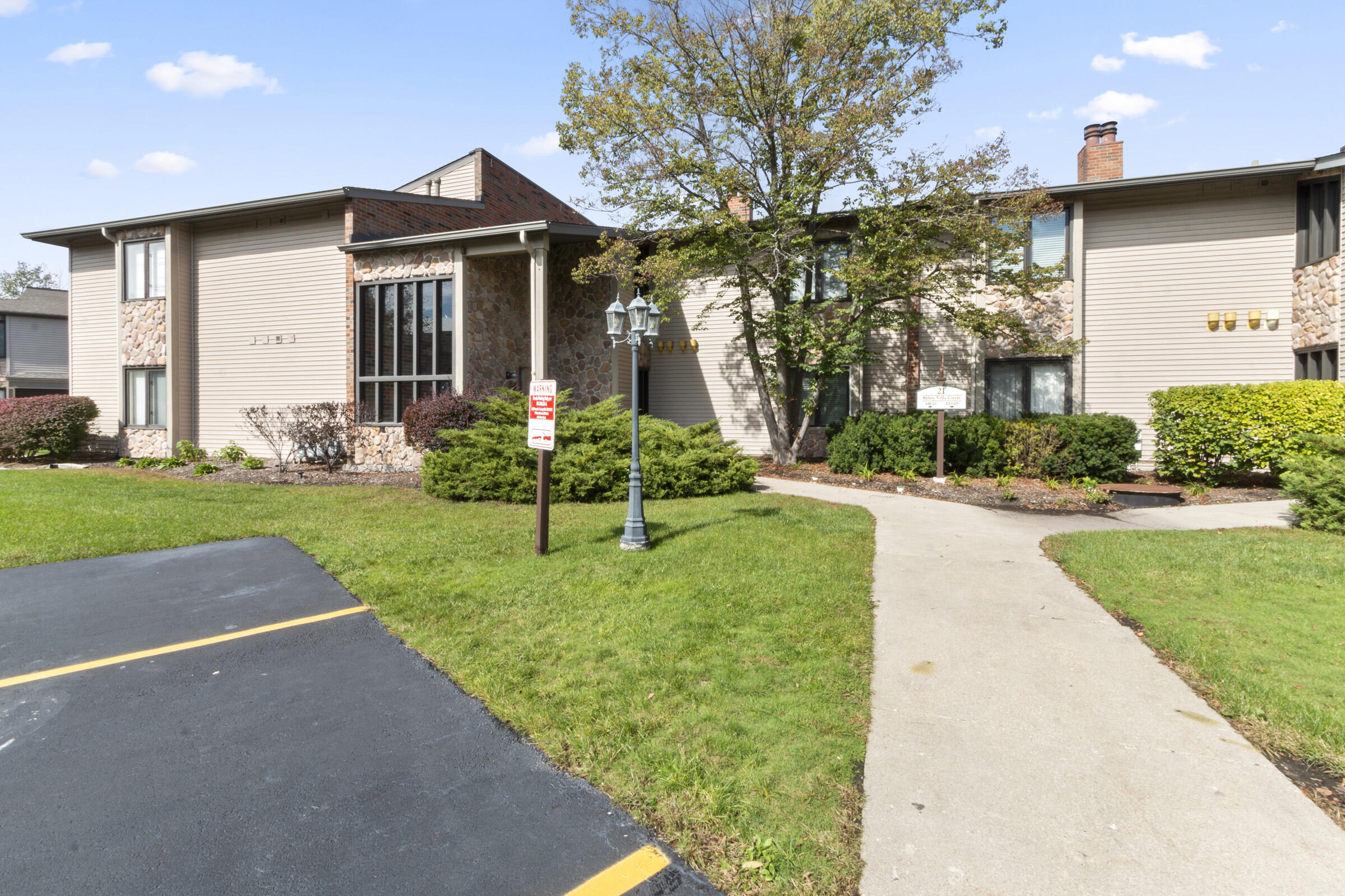21 Abbey Villa Circle, Unit 21C Fontana, WI 53125 - Photo 1 of 1 Building 21