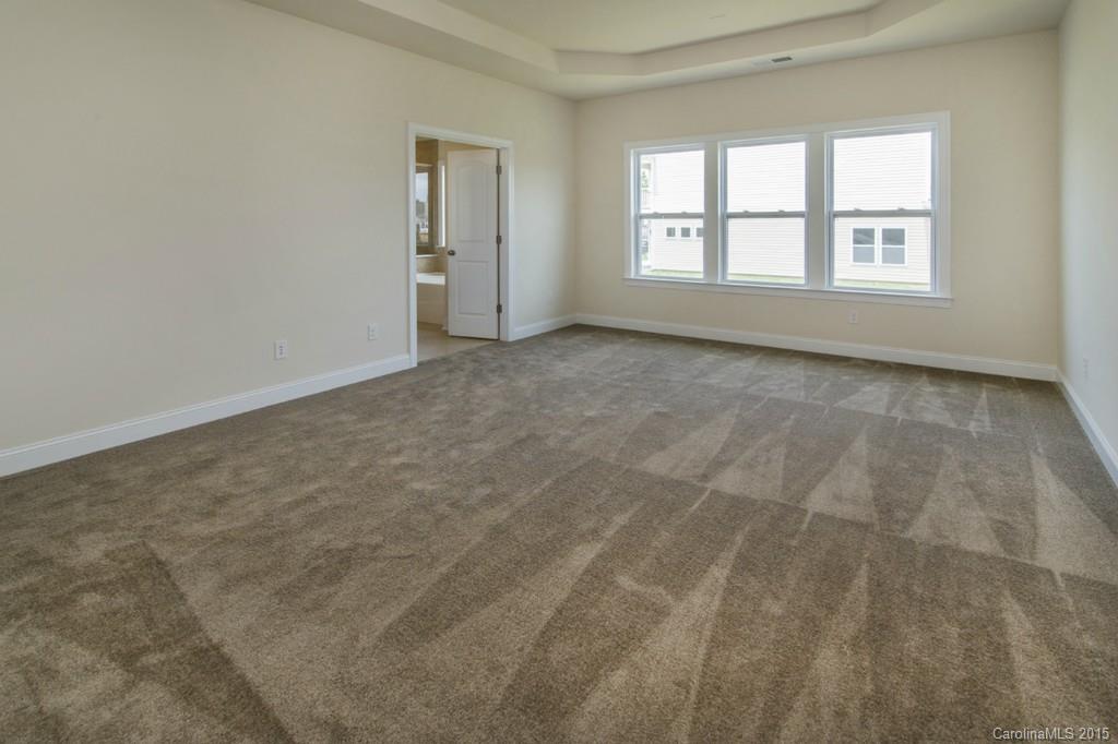 86524 Arrington Road, Unit 48 Lancaster, SC 29720 - Photo 14 of 19 an empty room with windows