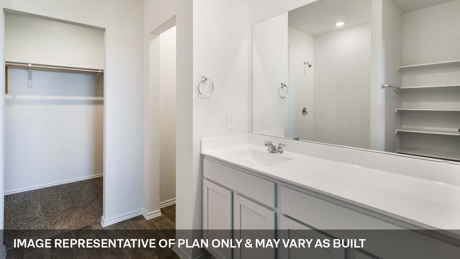 1173 Celosia Loop Kyle, TX 78640 - Photo 9 of 15 a bathroom with a sink and a mirror