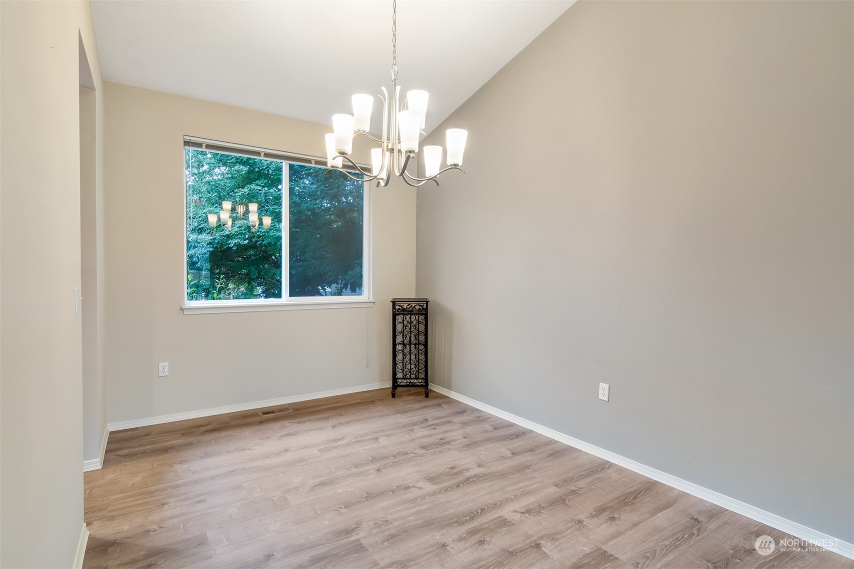 13197 Icicle Ridge Road Southeast Monroe, WA 98272 - Photo 8 of 25 wooden floor in an empty room with a window