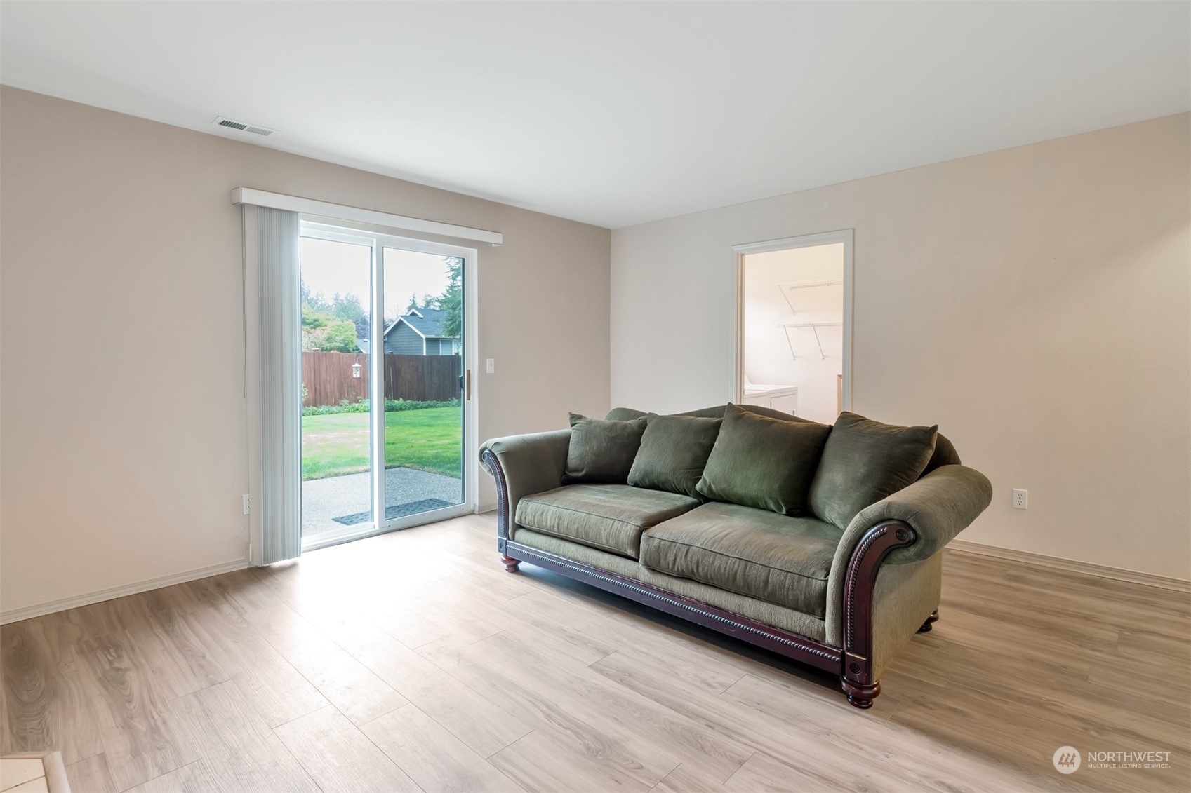 13197 Icicle Ridge Road Southeast Monroe, WA 98272 - Photo 10 of 25 a living room with a couch and a large window