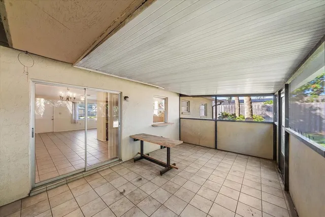 a view of an empty room and window