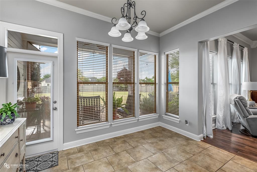 425 Kingston Road Benton, LA 71006 - Photo 16 of 35 a view of a livingroom with a floor to ceiling window and an entryway