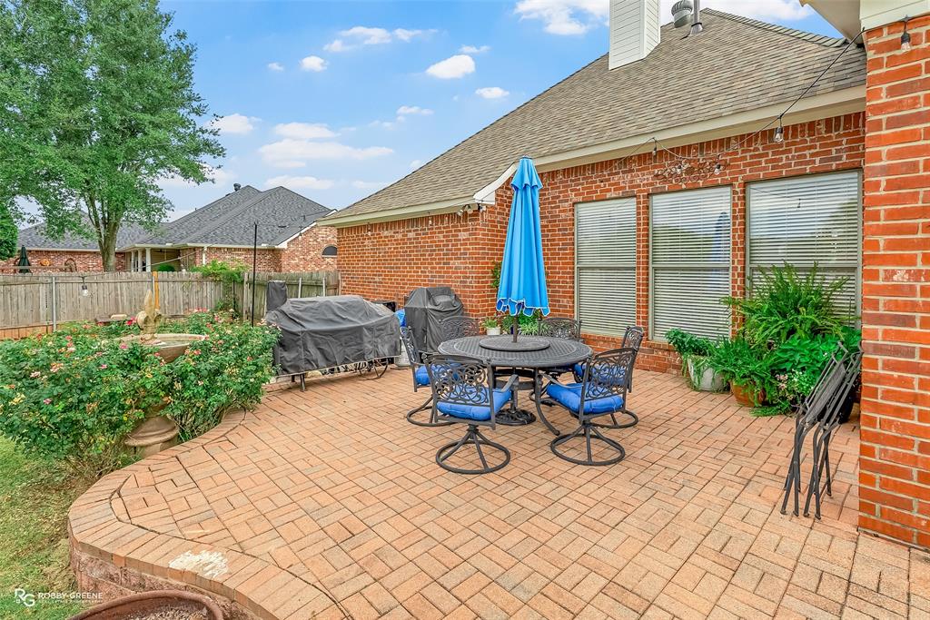 425 Kingston Road Benton, LA 71006 - Photo 29 of 35 a view of a backyard with sitting area