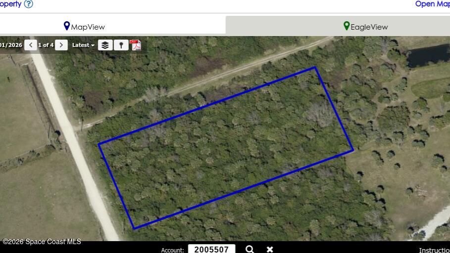 6215 Dixie Way Mims, FL 32754 - Photo 5 of 5 a view of a tennis court