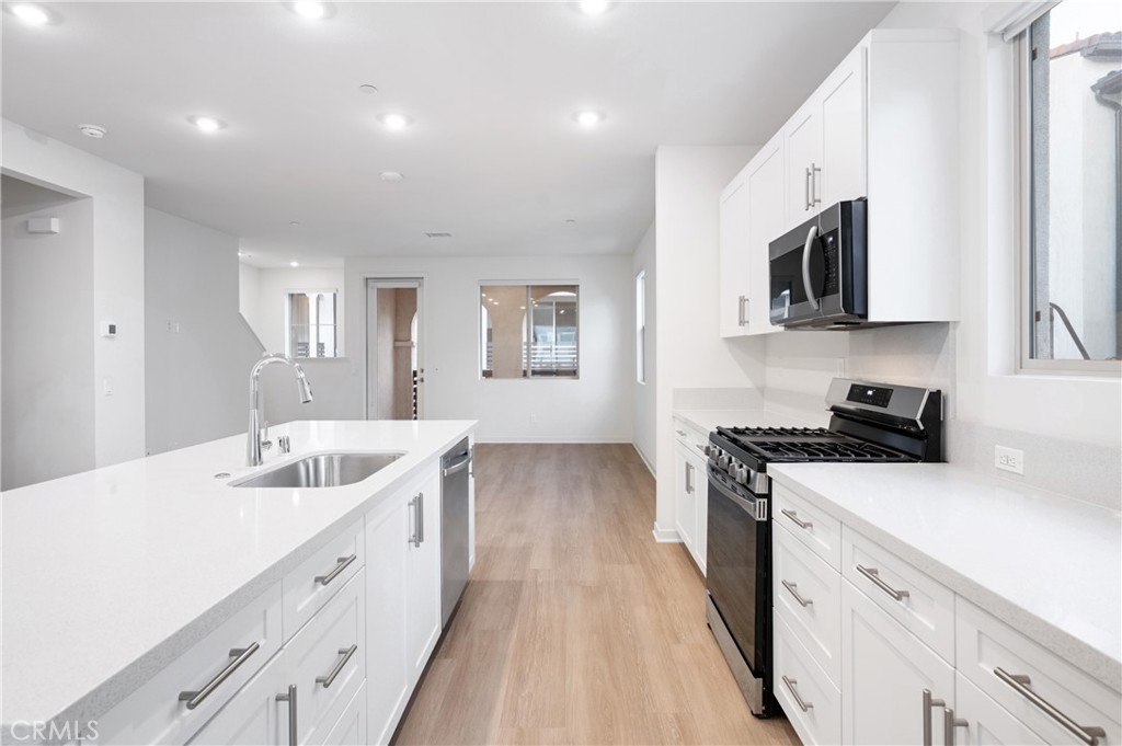 32040 Paseo Vienta San Juan Capistrano, CA 92675 - Photo 8 of 27 Kitchen and Living Room