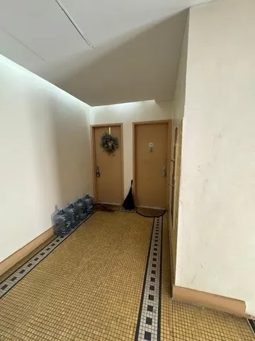 a view of a balcony with wooden floor