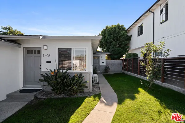 a house view with a garden space