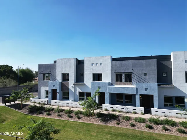 a view of building with yard