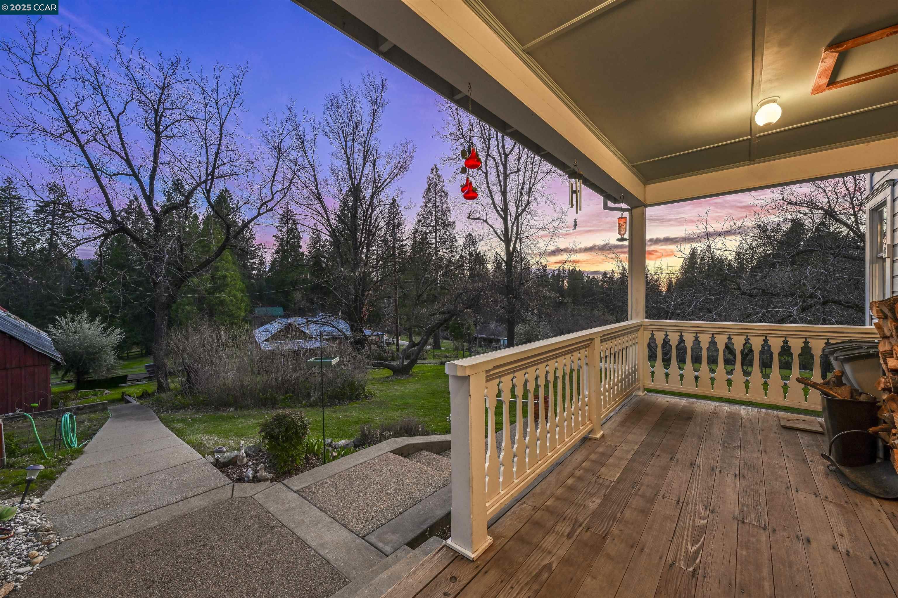 11417 Red Dog Road Nevada City, CA 95959 - Photo 38 of 56 a view of a wooden deck with a yard