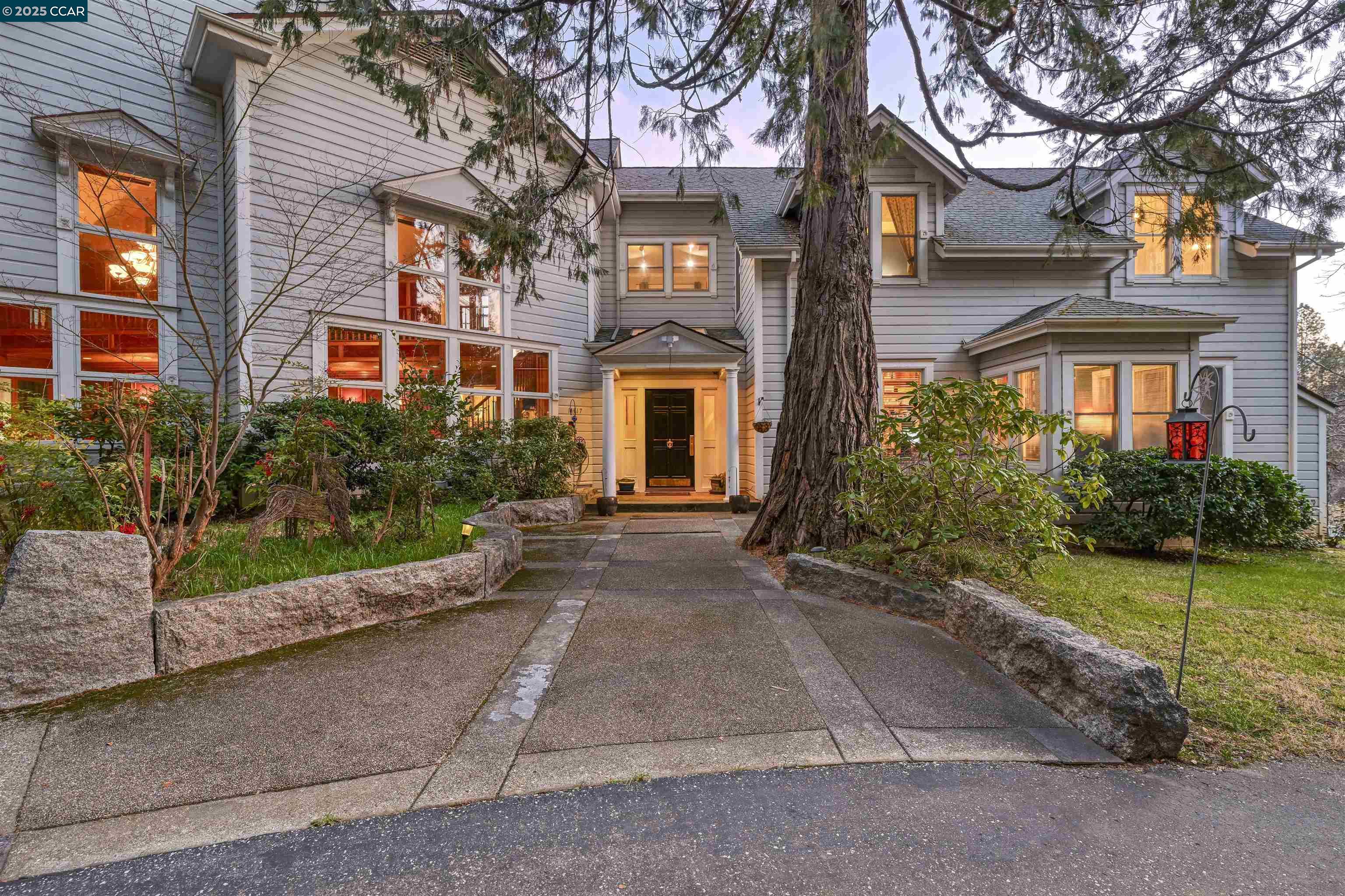 11417 Red Dog Road Nevada City, CA 95959 - Photo 5 of 56 front view of a brick house with a yard