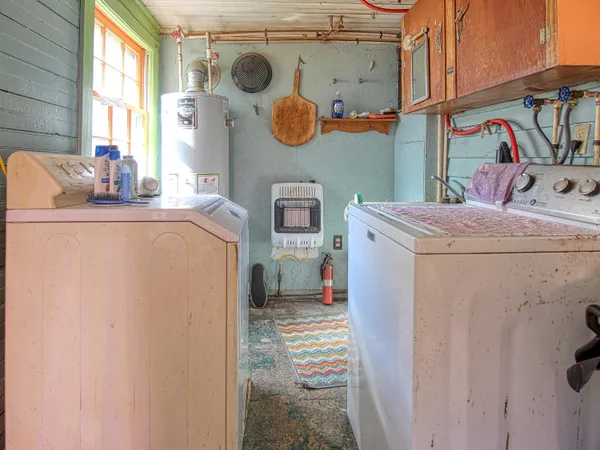 a bed room with a bed and furniture