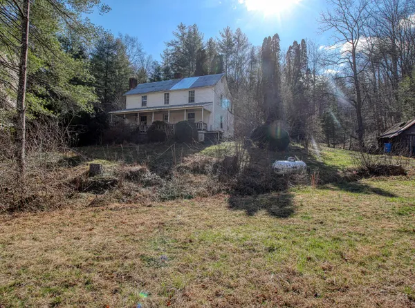 a view of a chairs and table in a room