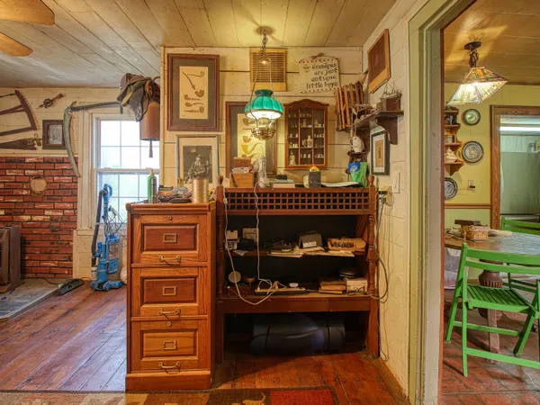a living room with furniture windows and a fireplace