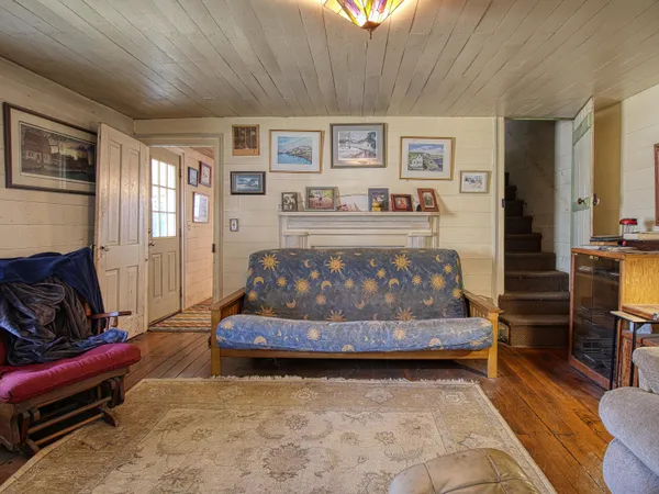 a kitchen with stainless steel appliances granite countertop a sink counter space cabinets and a large window