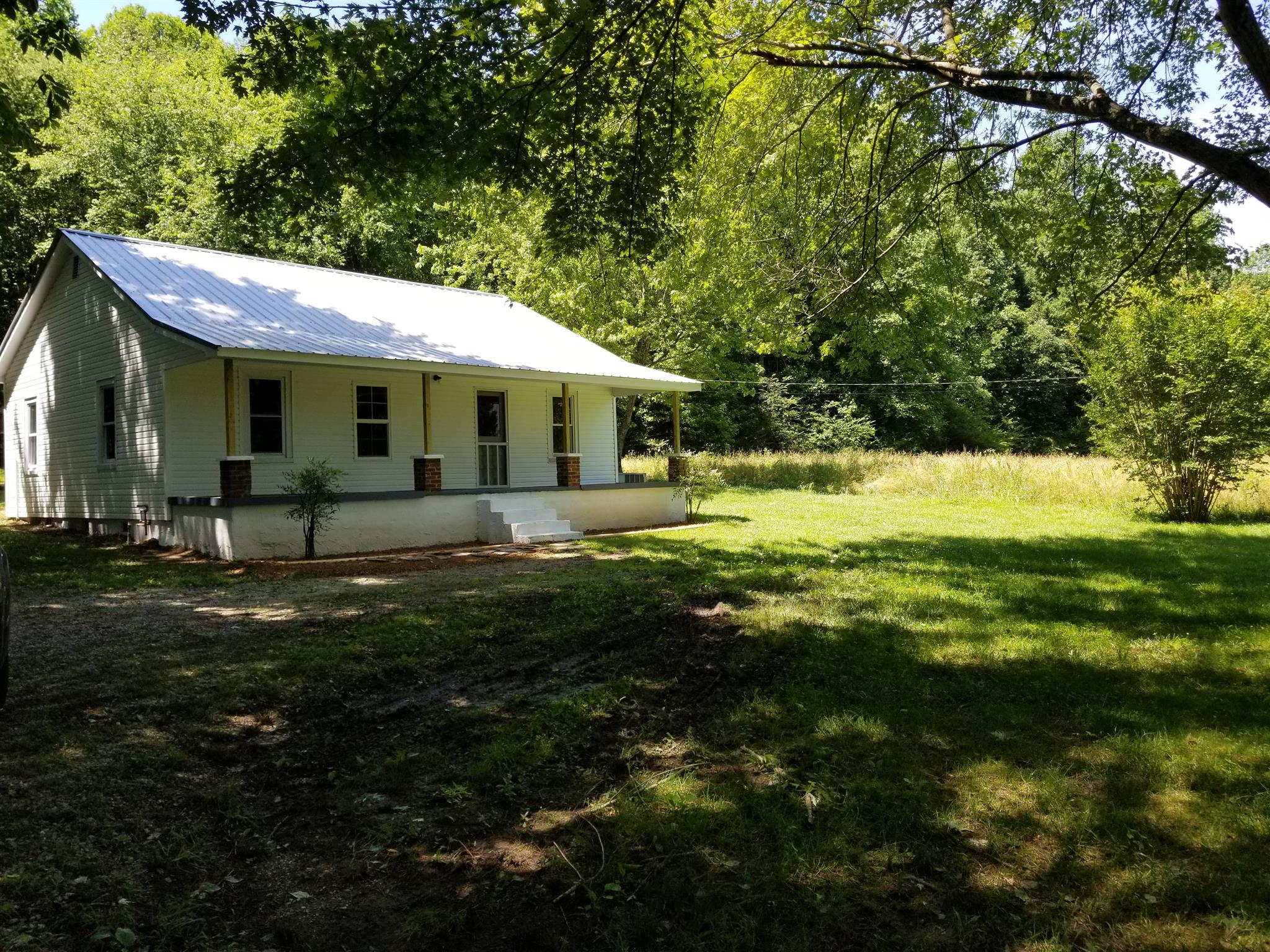 285 Buzzard Cave Road Waverly, TN 37185 - Photo 2 of 25 Beautiful shaded level yard