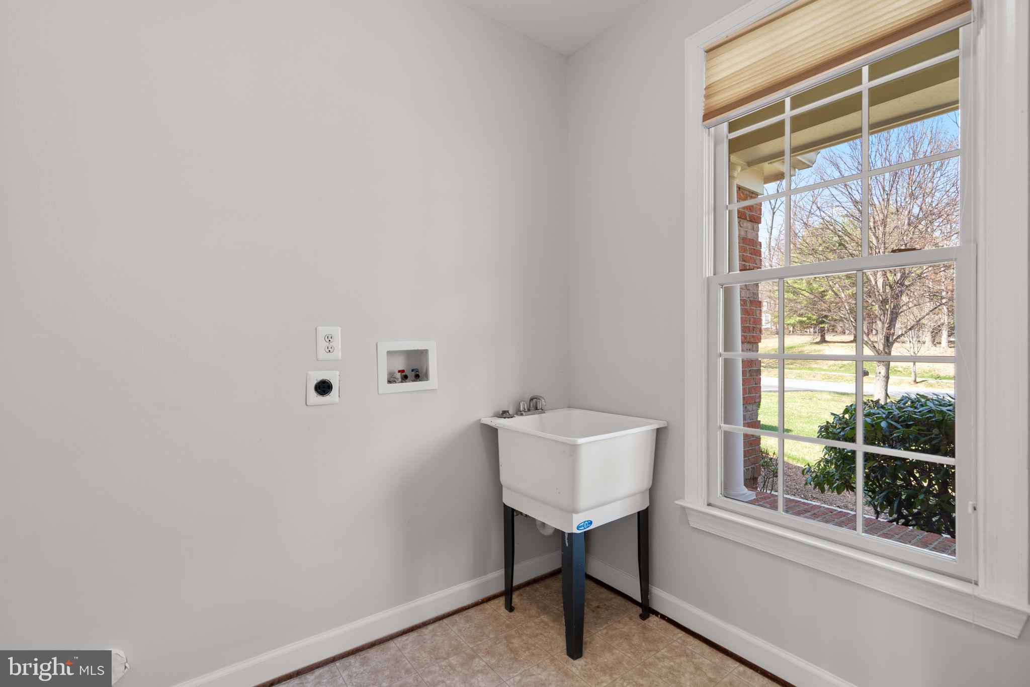 25114 Vista Ridge Road Laytonsville, MD 20882 - Photo 31 of 97 a view of a room that has a window and a sink