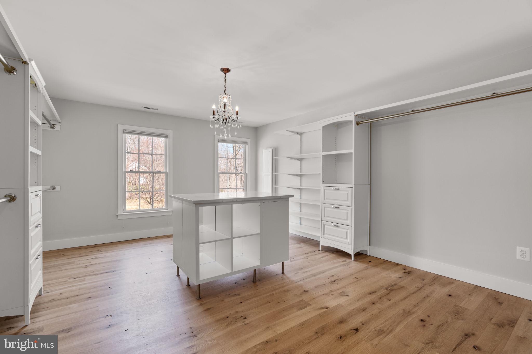 25114 Vista Ridge Road Laytonsville, MD 20882 - Photo 45 of 97 a view of empty room with wooden floor and fan