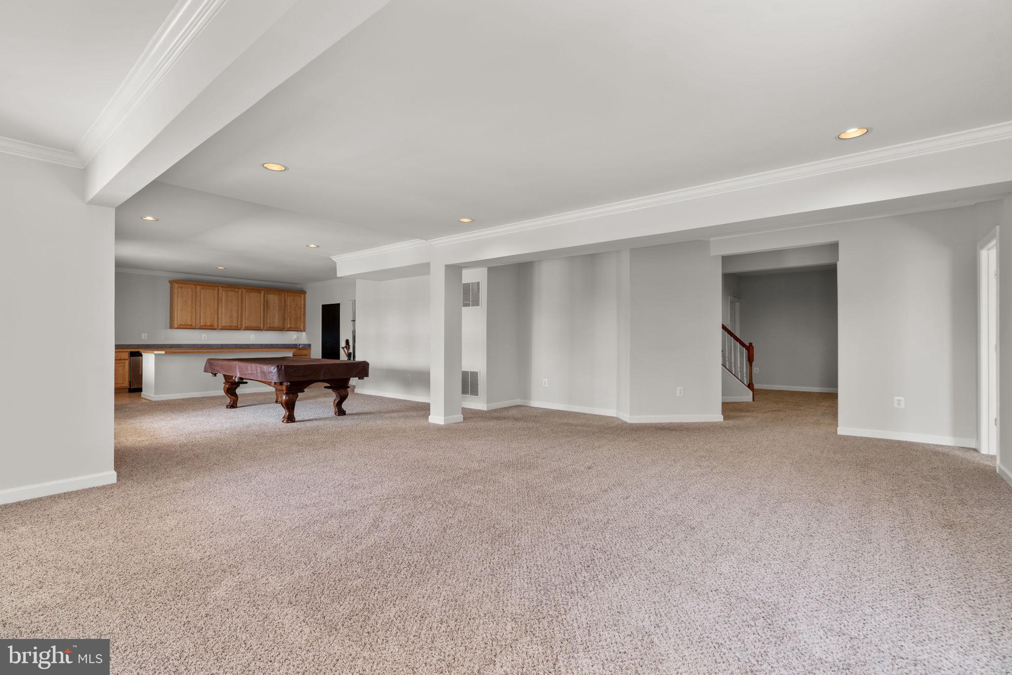 25114 Vista Ridge Road Laytonsville, MD 20882 - Photo 60 of 97 a view of a livingroom with a furniture and a ceiling fan