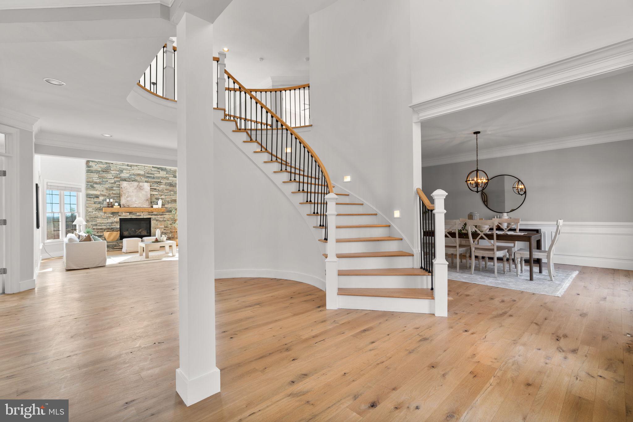 25114 Vista Ridge Road Laytonsville, MD 20882 - Photo 6 of 97 a view of entryway and hall with wooden floor