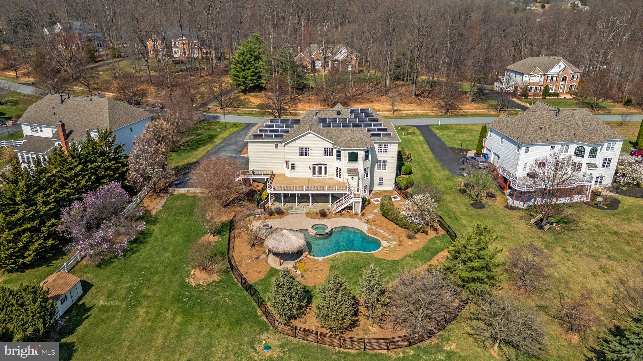 25114 Vista Ridge Road Laytonsville, MD 20882 - Photo 90 of 97 an aerial view of a house with a yard basket ball court and outdoor seating