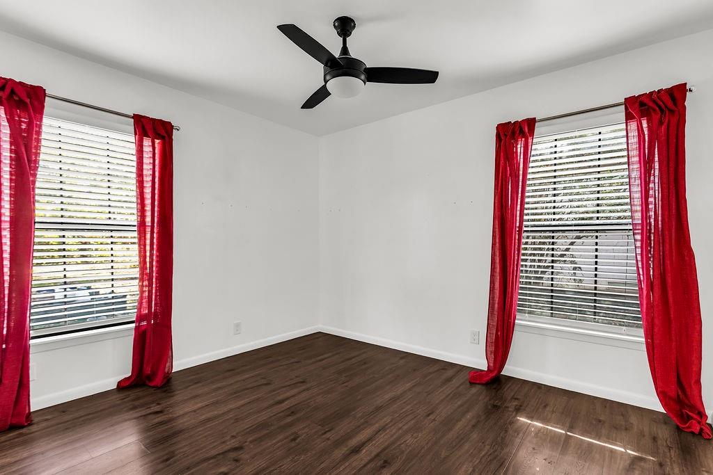 9440 Magnolia Road Frisco, TX 75033 - Photo 15 of 29 a view of empty room with wooden floor and fan
